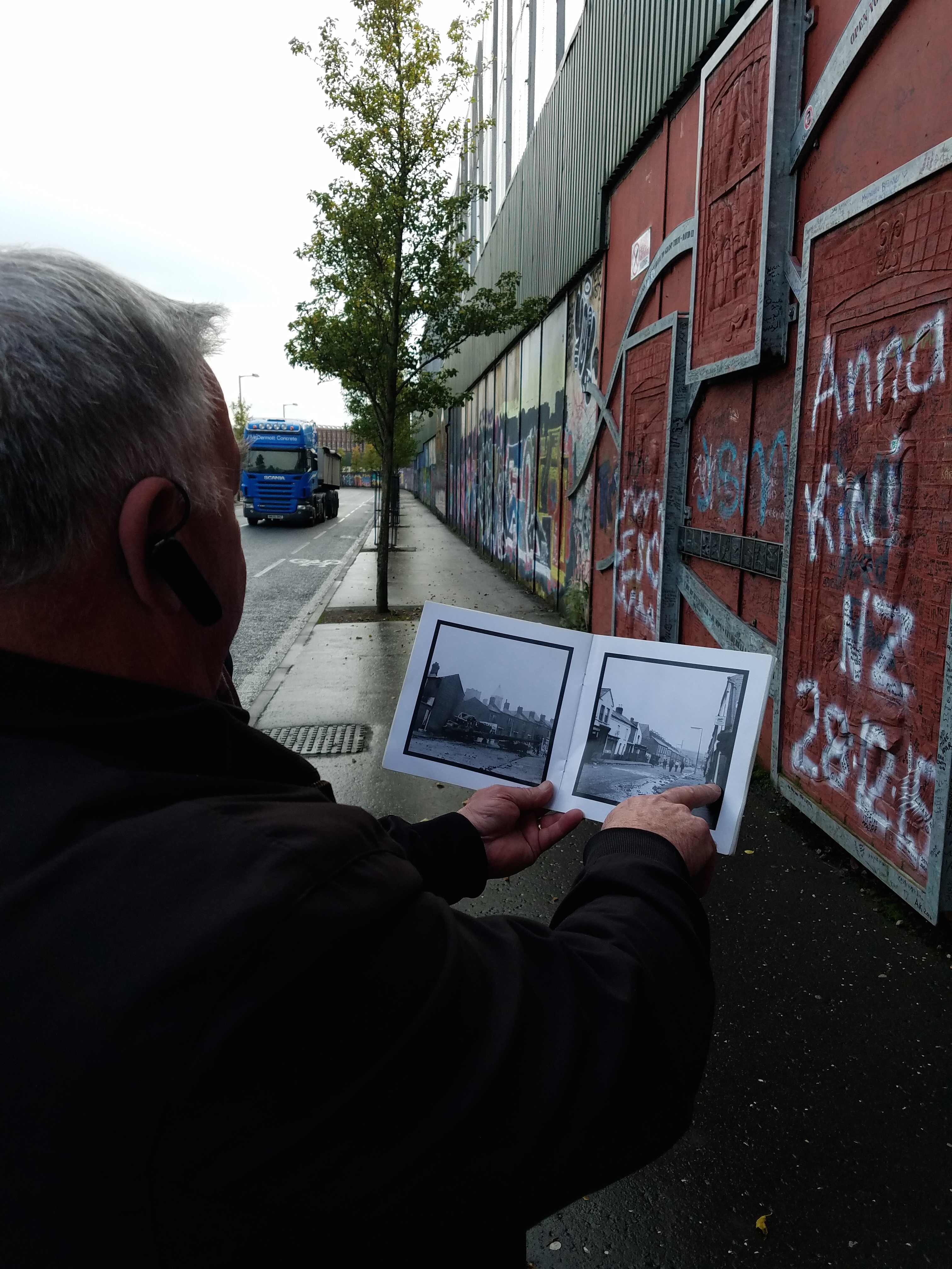 Eugene showing us photos of the area during the height of the Troubles. 